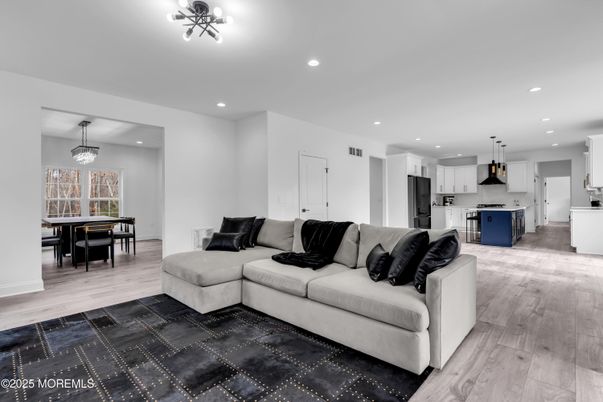 Dining room, Interior, Kitchen, Living room, Pendant Lights, Recessed Lighting, Stainless Steel Appliances, Wood Texture Flooring