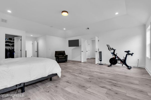 Bedroom, Fitness Equipment, Interior, Recessed Lighting, Wood Texture Flooring