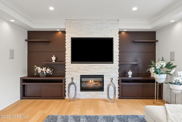 Fireplace, Interior, Recessed Lighting, Stone Walls, Wood Texture Flooring