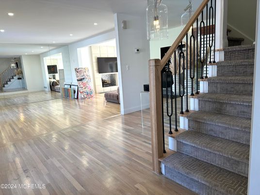 Fireplace, Interior, Pendant Lights, Recessed Lighting, Wood Texture Flooring