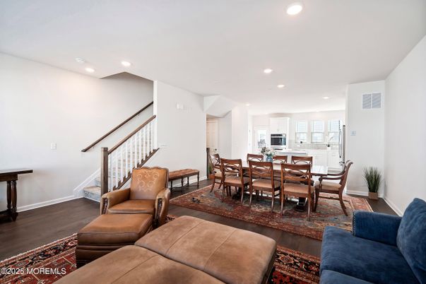 Dining room, Interior, Kitchen, Living room, Recessed Lighting, Stainless Steel Appliances, Wood Texture Flooring