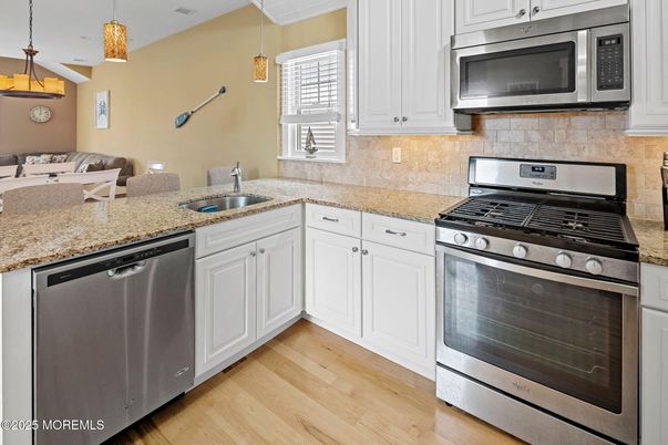Interior, Kitchen, Pendant Lights, Stainless Steel Appliances, Wood Texture Flooring