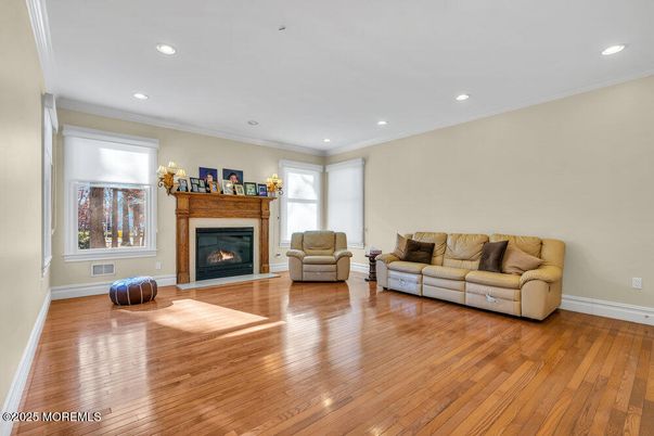 Fireplace, Interior, Living room, Recessed Lighting, Wood Texture Flooring