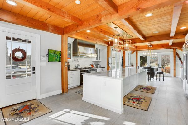 Chandelier, Dining room, Interior, Kitchen, Pendant Lights, Recessed Lighting, Stainless Steel Appliances, Wooden Beams, Wooden Ceilings