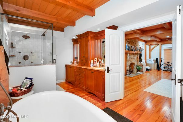 Bathroom, Fireplace, Glass Shower, Interior, Recessed Lighting, Wooden Beams, Wooden Ceilings, Wood Texture Flooring