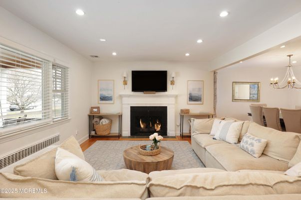 Chandelier, Dining room, Fireplace, Interior, Living room, Recessed Lighting, Wood Texture Flooring