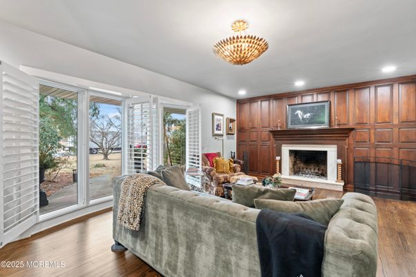 Fireplace, Interior, Living room, Recessed Lighting, Wood Texture Flooring, Wooden Walls