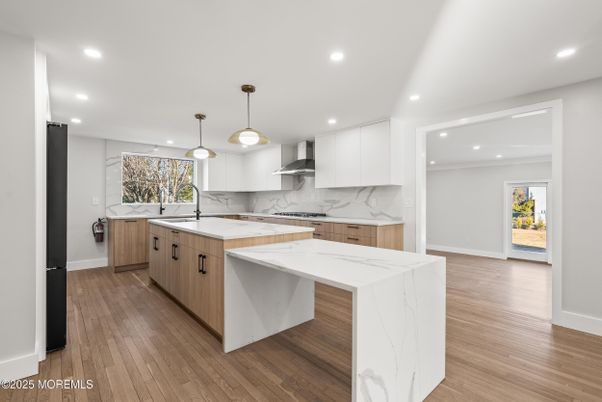 Interior, Kitchen, Marble Walls, Pendant Lights, Recessed Lighting, Wood Texture Flooring