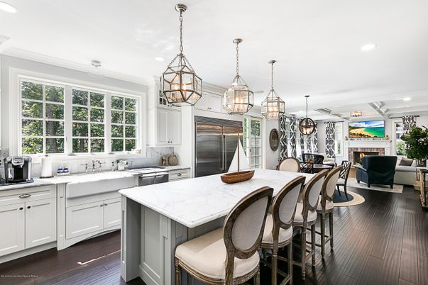 Dining room, Fireplace, Interior, Kitchen, Living room, Pendant Lights, Recessed Lighting, Stainless Steel Appliances, Wood Texture Flooring