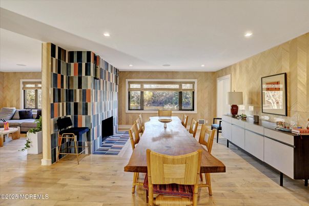 Dining room, Fireplace, Interior, Living room, Recessed Lighting, Wood Texture Flooring