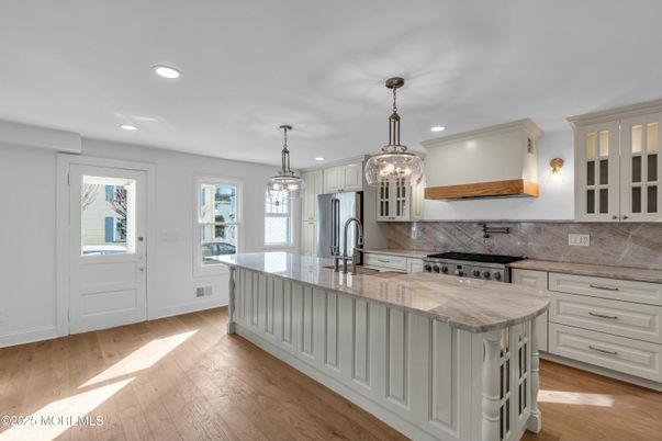 Chandelier, Interior, Kitchen, Pendant Lights, Recessed Lighting, Stainless Steel Appliances, Wood Texture Flooring