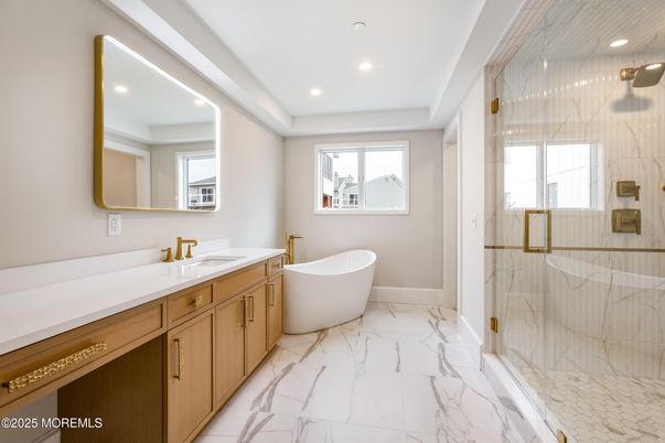Bathroom, Dual Sink Vanities, Free Standing Baths, Glass Shower, Interior, Marble, Marble Walls, Recessed Lighting