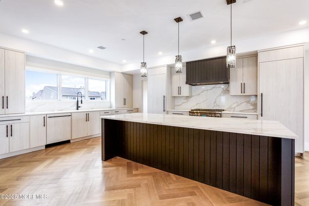 Interior, Kitchen, Marble Walls, Pendant Lights, Recessed Lighting, Wood Texture Flooring