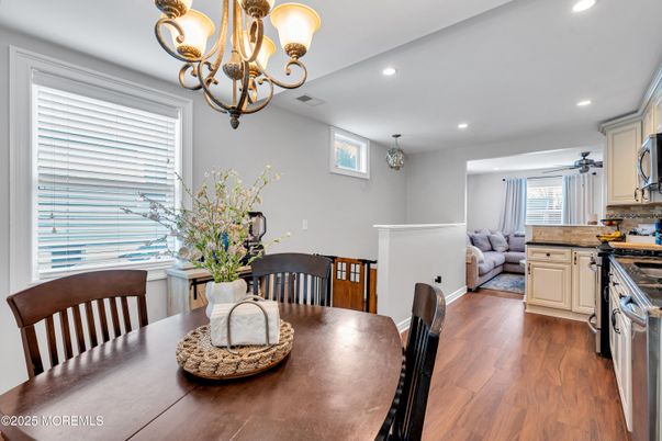 Chandelier, Dining room, Interior, Kitchen, Living room, Recessed Lighting, Wood Texture Flooring