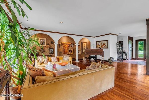 Fireplace, Interior, Living room, Piano, Recessed Lighting, Wood Texture Flooring