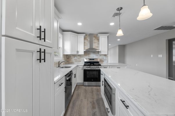 Interior, Kitchen, Pendant Lights, Recessed Lighting, Stainless Steel Appliances, Wood Texture Flooring