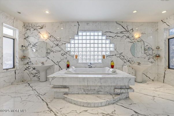 Bathroom, Dual Sink Vanities, Interior, Marble, Marble Walls, Recessed Lighting