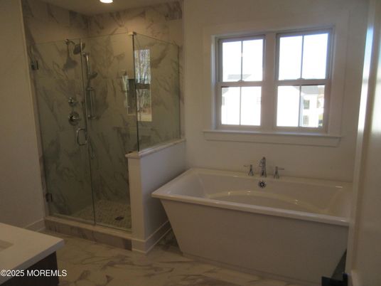 Bathroom, Free Standing Baths, Glass Shower, Interior, Marble, Marble Walls, Recessed Lighting