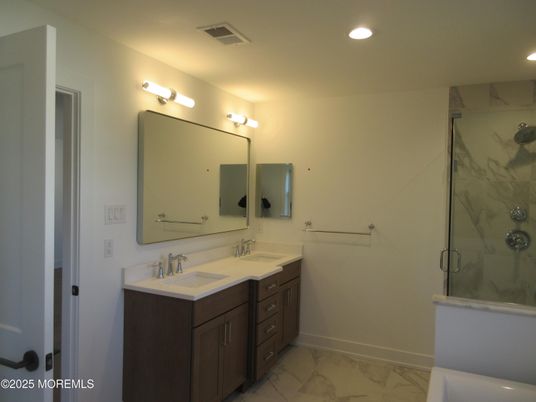 Bathroom, Dual Sink Vanities, Glass Shower, Interior, Marble, Marble Walls, Recessed Lighting
