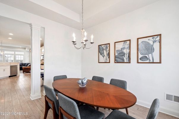 Chandelier, Dining room, Interior, Living room, Recessed Lighting, Wood Texture Flooring