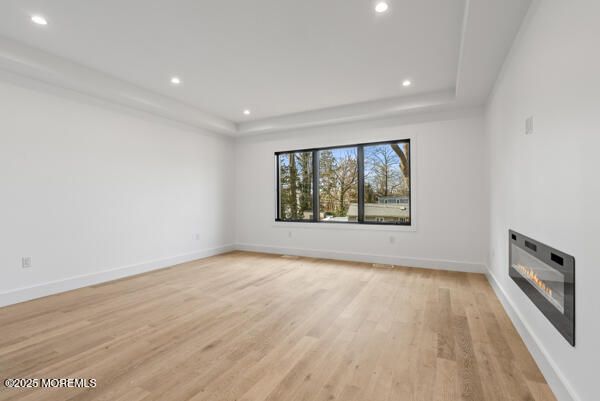 Empty room, Fireplace, Interior, Recessed Lighting, Wood Texture Flooring