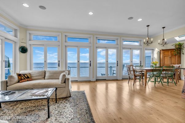 Chandelier, Dining room, Interior, Living room, Recessed Lighting, Water, Wood Texture Flooring