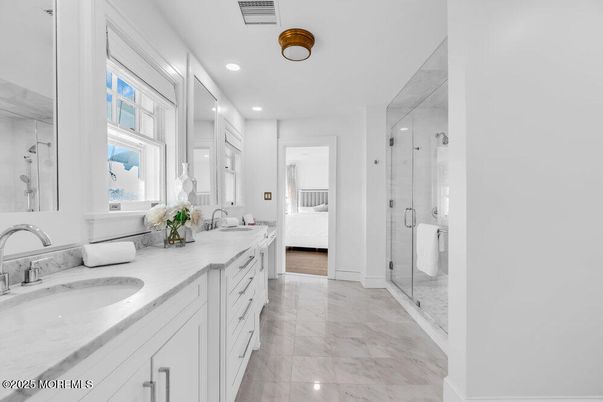 Bathroom, Dual Sink Vanities, Glass Shower, Interior, Marble, Recessed Lighting