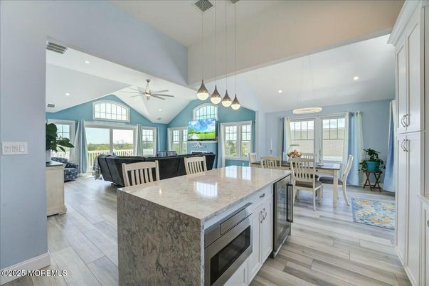 Dining room, Interior, Kitchen, Living room, Pendant Lights, Recessed Lighting, Wood Texture Flooring