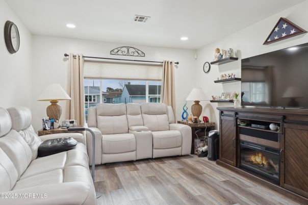 Fireplace, Interior, Living room, Recessed Lighting, Wood Texture Flooring