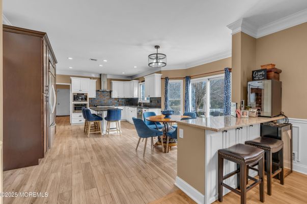 Dining room, Interior, Kitchen, Recessed Lighting, Stainless Steel Appliances, Wood Texture Flooring