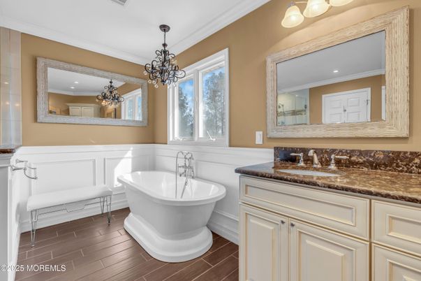 Bathroom, Chandelier, Dual Sink Vanities, Free Standing Baths, Interior, Recessed Lighting, Wood Texture Flooring