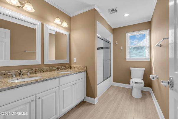 Bathroom, Dual Sink Vanities, Interior, Recessed Lighting, Wood Texture Flooring