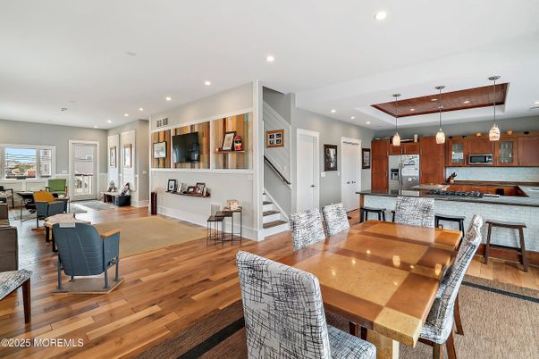Dining room, Interior, Kitchen, Pendant Lights, Recessed Lighting, Stainless Steel Appliances, Wood Texture Flooring