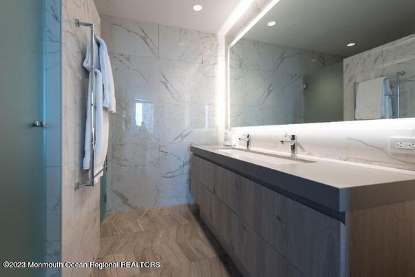 Bathroom, Dual Sink Vanities, Glass Shower, Interior, Marble Walls, Recessed Lighting, Wood Texture Flooring