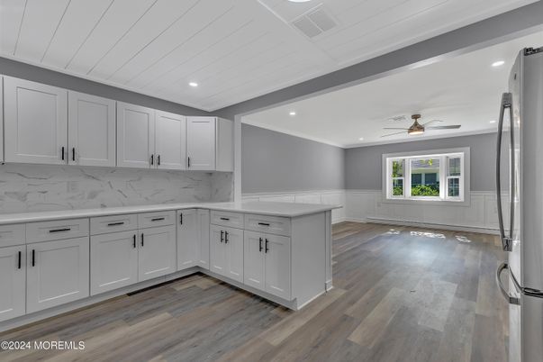 Interior, Kitchen, Marble Walls, Recessed Lighting, Wood Texture Flooring