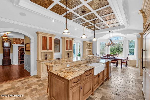 Chandelier, Dining room, Interior, Kitchen, Pendant Lights, Recessed Lighting, Stainless Steel Appliances, Wood Texture Flooring