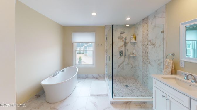 Bathroom, Free Standing Baths, Glass Shower, Interior, Marble, Marble Walls, Recessed Lighting