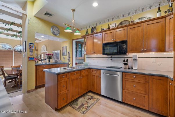 Dining room, Interior, Kitchen, Pendant Lights, Recessed Lighting, Stainless Steel Appliances, Wood Texture Flooring