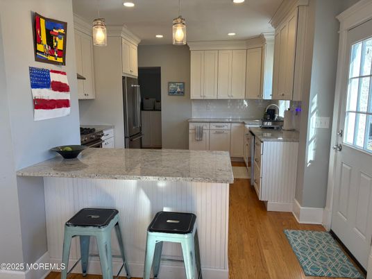 Interior, Kitchen, Pendant Lights, Recessed Lighting, Stainless Steel Appliances, Wood Texture Flooring
