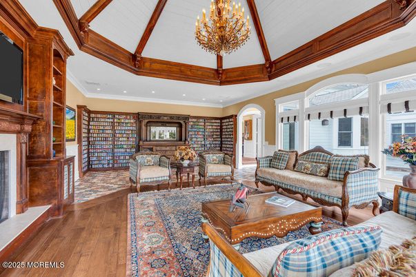 Chandelier, Fireplace, Interior, Living room, Recessed Lighting, Wood Texture Flooring