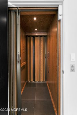 Elevator, Interior, Recessed Lighting, Wooden Walls