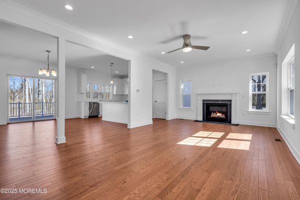 Empty room, Fireplace, Interior, Kitchen, Pendant Lights, Recessed Lighting, Wood Texture Flooring