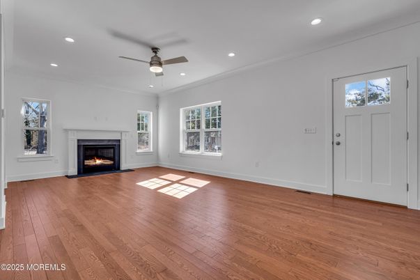 Empty room, Fireplace, Interior, Recessed Lighting, Wood Texture Flooring