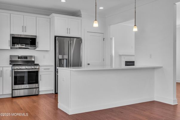 Interior, Kitchen, Pendant Lights, Recessed Lighting, Stainless Steel Appliances, Wood Texture Flooring
