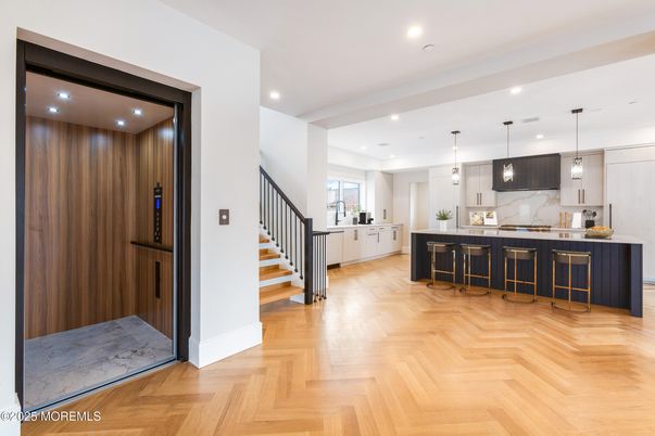 Interior, Kitchen, Marble Walls, Pendant Lights, Recessed Lighting, Wood Texture Flooring