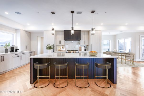 Interior, Kitchen, Marble Walls, Pendant Lights, Recessed Lighting, Wood Texture Flooring