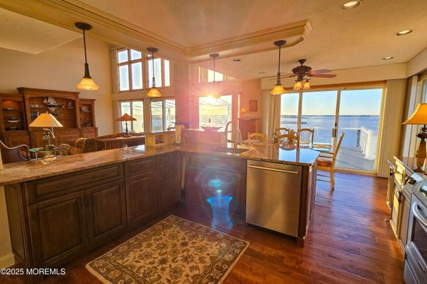 Dining room, Interior, Kitchen, Pendant Lights, Recessed Lighting, Water, Wood Texture Flooring