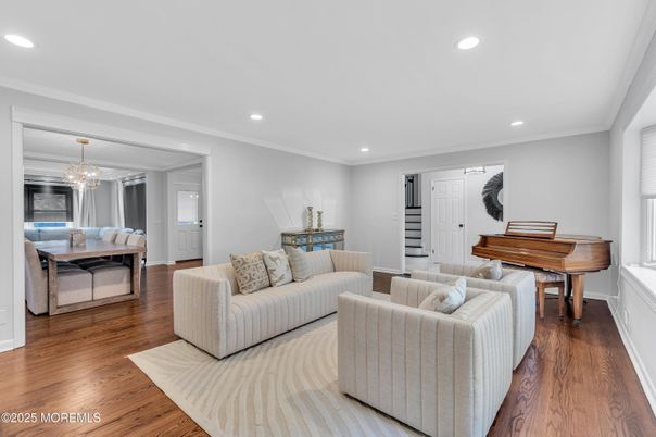 Chandelier, Dining room, Interior, Living room, Piano, Recessed Lighting, Wood Texture Flooring