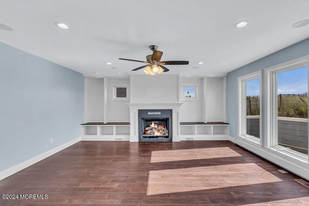 Empty room, Fireplace, Interior, Recessed Lighting, Wood Texture Flooring