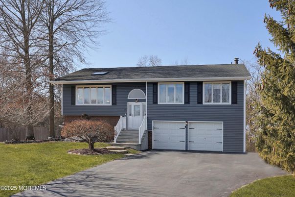 Attached, Exterior, Facade, Raised Ranch